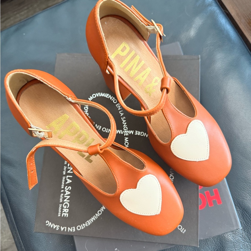 Ina brown Orange T-Strap platforms with Cream Heart Accent